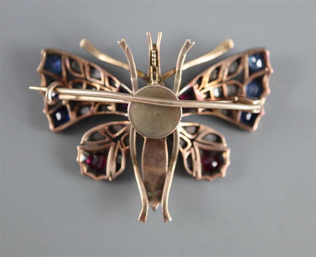 A Victorian, gold and silver, ruby, sapphire, split pearl and rose cut diamond set butterfly pendant brooch,